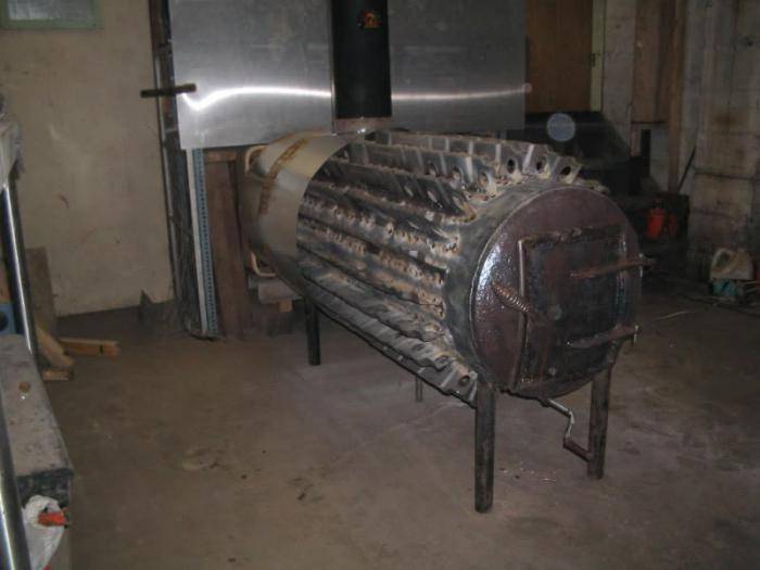 Как сделать печь для гаража на дровах длительного горения своими руками